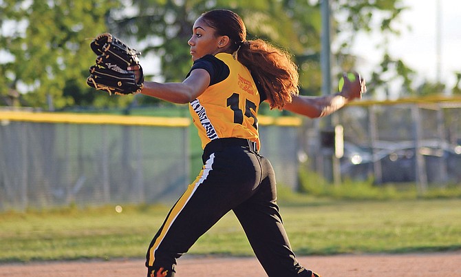 PITCHER’S DELIGHT: Mechelle Moss on the mound last night as the Sunshine Auto Wildcats pulled off a 12-7 victory over the Platinum Pool Sharks in the Banker’s Field at the Baillou Hills Sporting Complex.

Photo: Shawn Hanna/Tribune Staff

 

 