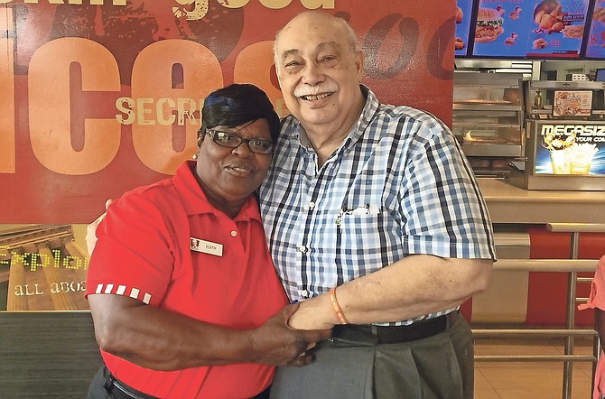 Edith Stuart with George Myers, KFC Nassau’s chairman and CEO.