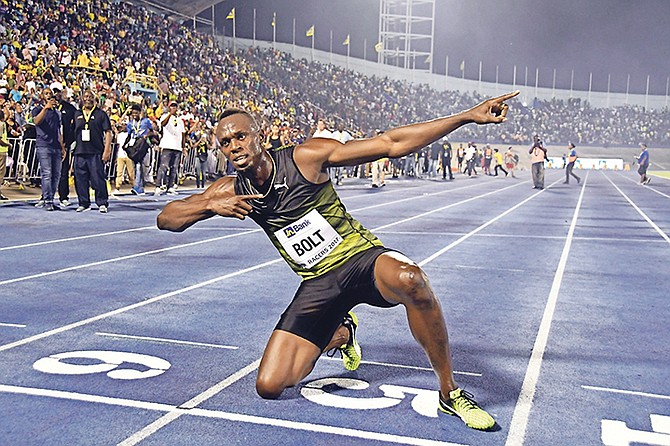 Jamaica’s Usain Bolt celebrates after winning the “Salute to a Legend “ 100 metres during the Racers Grand Prix at the national stadium in Kingston, Jamaica, on Saturday. Bolt started his final season with his last race on Jamaican soil and plans to retire from track and field after the 2017 London World Championships in August.

(AP Photo/Bryan Cummings)

 