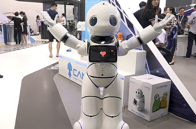 THE Canbot from Beijing’s Canny Unisrobo Technology Co. Ltd. performs at the Shanghai CES electronic show in Shanghai, China. (AP)