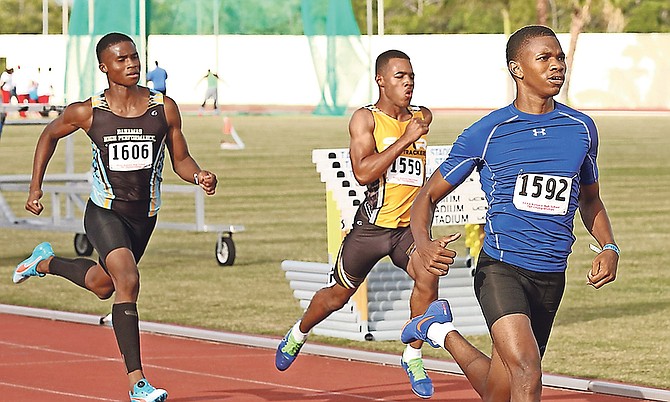 FAST TRACK: Junior athletes compete in the Bahamas Association of Athletic Associations’ Aliv National Junior Championships in the original Thomas A Robinson track and field stadium over the weekend. Photo: Terrel W Carey/Tribune Staff