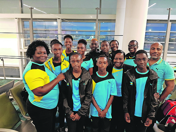 THE BAHAMAS team to the first NACAC Age Group Championships in Trinidad & Tobago with coaching staff members.