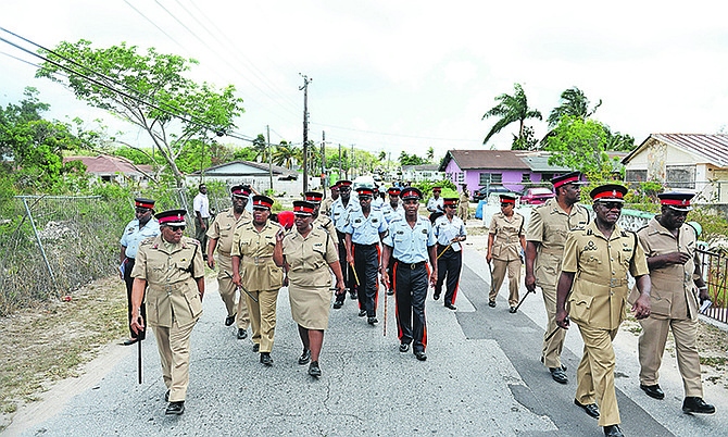 The Royal Bahamas Police Force held a walkabout in the Rock Crusher Road community to check on residents and their safety, as well as taking the opportunity to invite children to attend their upcoming summer camp.
Photo: Shawn Hanna/Tribune Staff

 