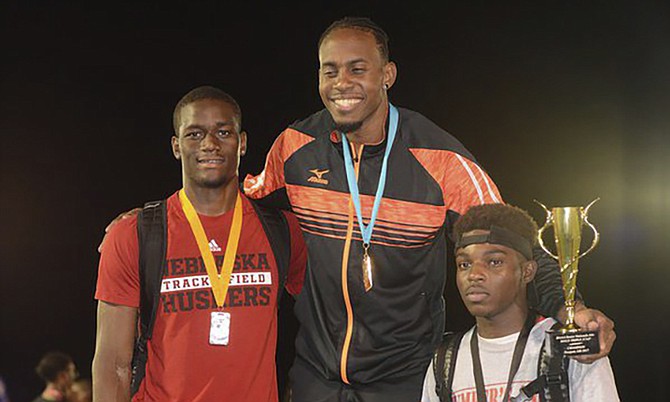 Leevan Sands sharing the spotlight with Kaiwan Culmer (left) and Ronald Ferguson (right).