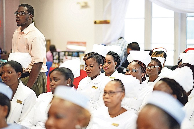 A celebration was held at the Ministry of Health for the promotion of registered and trained clinical nurses in the Department of Public Health. Photo: Shawn Hanna/Tribune Staff


