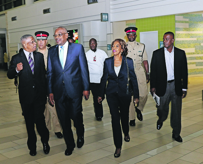 PRIME Minister Dr Hubert Minnis travelled to Grenada on Monday for the 38th regular meeting of the Conference of Heads of Government of the Caribbean Community (CARICOM), which runs from July 4-6. It will be Dr Minnis’ first CARICOM meeting as prime minister of The Bahamas. He is pictured at LPIA early this morning with his wife, Patricia, accompanied also by Office of the Prime Minister Permanent Secretary Jack Thompson (left) and Commissioner of Police Ellison Greenslade (second left). Photo:Patrick Hanna/BIS