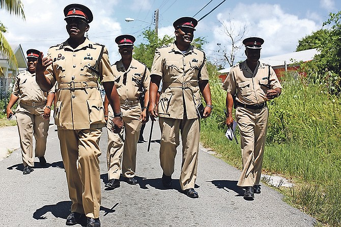 The Royal Bahamas Police Force conducted a walkabout in Foxhill as a result of the number of recent shootings in the area. Photos: Terrel W. Carey/Tribune Staff
