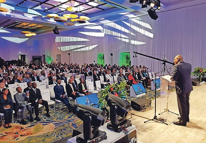 PRIME Minister Dr Hubert Minnis addresses attendees at the opening ceremony of the Global Symposium for Regulators held in the Imperial Ballroom of the Atlantis resort. Photos: OPM Media Services
