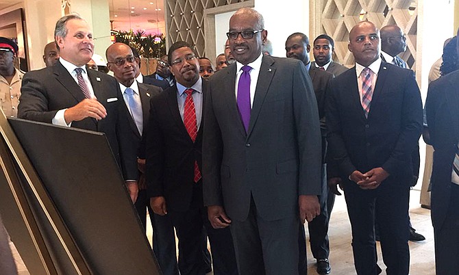 Prime Minister Dr Hubert Minnis (centre) with Education Minister Jeffrey Lloyd, Deputy Prime Minister and Minister of Finance K Peter Turnquest and National Security Minister Marvin Dames at the Baha Mar resort.