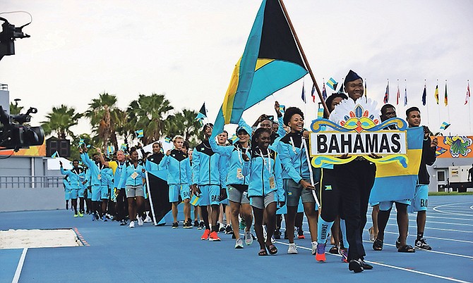 The Bahamas team marches in for the opening of the sixth Commonwealth Youth Games. The team earned its first medals last nigh – two bronzes in judo. Photo: Terrel W. Carey/Tribune Staff

