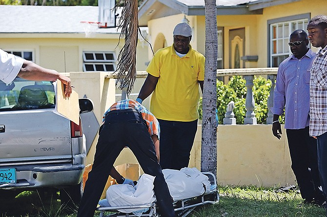 The body of a man found in the area of Elizabeth Estates on Malaysia Way and Commonwealth Boulevard. The man’s vehicle was parked nearby where police found a large quantity of drugs and an NIB card which is believed to be the ID of the victim.

Photo: Terrel W. Carey/Tribune Staff

 