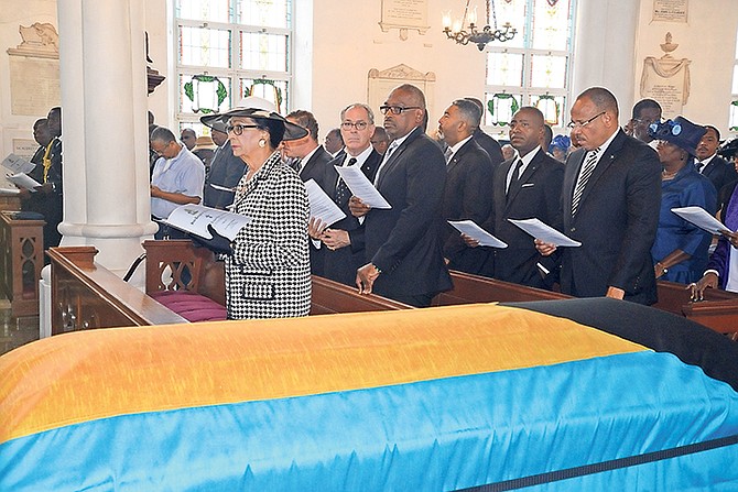 GOVERNOR General Dame Marguerite Pindling and Prime Minister Dr Hubert Minnis among mourners at the funeral of Cleophas Adderley. Photo: Peter Ramsay/BIS

 