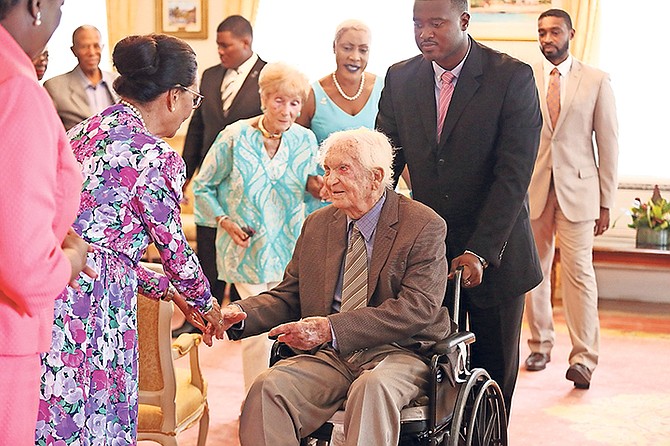 Governor General Dame Marguerite Pindling greets Sir Durward Knowles during a courtesy visit yesterday at the start of a 100-day countdown to his 100th birthday. Photo: Terrel W. Carey/Tribune Staff
