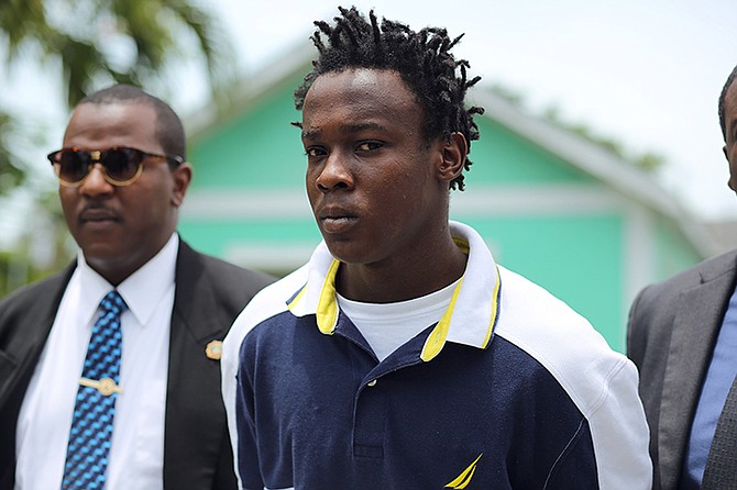 Julio Deveaux, 18, outside court yesterday. He is accused of three murders.

Photo: Terrel W. Carey/Tribune Staff