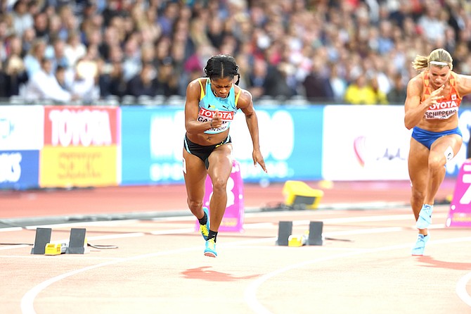Tynia Gaither competes in here heat. Photo: Kermit Taylor/Bahamas Athletics