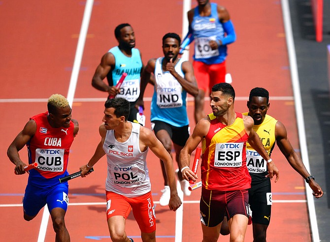 The Bahamas in action in the men's 4x400 relay heats. None of the relays teams managed to qualify. (AP)