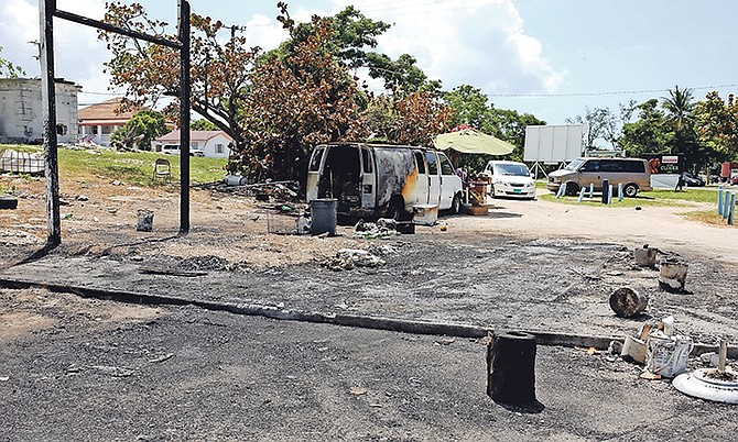 The fruit stand on the corner of Chippingham Road opposite Arawak Cay which burned down on Saturday evening. Owner Florence Miller also lost a number of items she had stored in a van.
Photo: Terrel W. Carey/Tribune Staff
