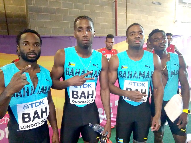 A disappointed men's 4 x 400m relay team of Ramon Miller, Ojay Ferguson, Michael Mathieu and Alonso Russell.