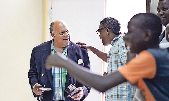 Founder and principal director of The Family Group Therapy Project Dr David Allen is surprised as he arrives at a birthday party thrown for him by members of “The Family”. Dr Allen was joined by his wife, Dr Victorial Allen; daughter, Dr Marie Carroll, and other members of his family. Photo: Shawn Hanna/Tribune Staff