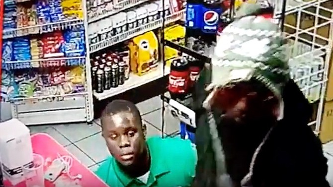 A still from the video of the armed robbery.