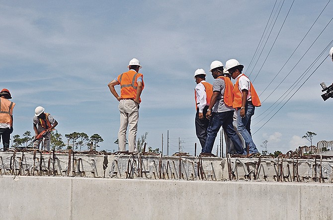 Officials visit the Fishing Hole Road bridge construction project in Grand Bahama on Monday. Photo: Vandyke Hepburn/BIS

