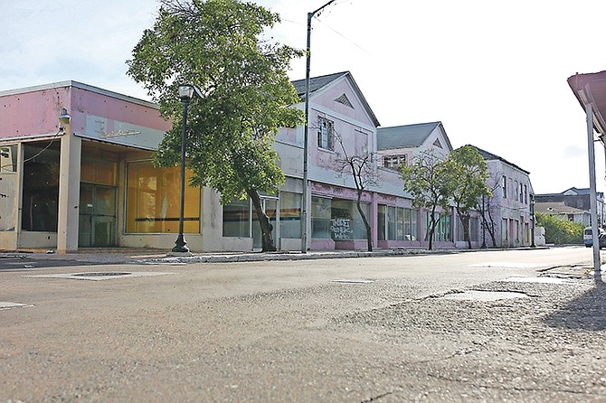 Closed Businesses downtown on East Bay Street. Photo: Terrel W. Carey/Tribune Staff
