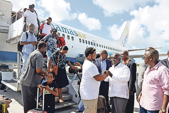 Prime Minister Dr Hubert Minnis and Leader of the Opposition Philip ‘Brave’ Davis, MP for Cat Island, greet evacuees arriving in Nassau. Photo: Shawn Hanna/Tribune staff


