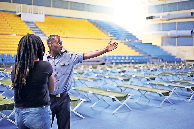 Sir Kendal Issacs Gymnasium being prepared for people in need of shelter yesterday. Photo: Terrel W. Carey/Tribune Staff
