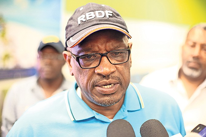 Prime Minister Dr Hubert Minnis speaks with the media after his return from visiting the Family Islands. Photo: Terrel W. Carey/Tribune Staff

