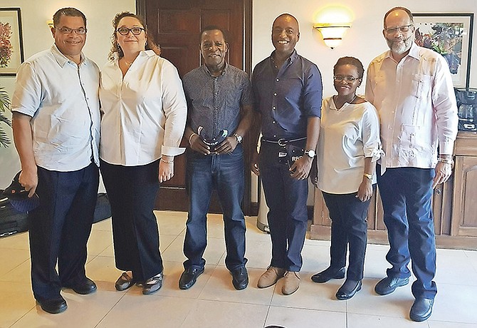 MINISTER of Foreign Affairs Darren Henfield (third right) hosted a small luncheon for CARICOM Chairman and Grenada Prime Minister Dr Keith Mitchell (third left) on Saturday, September 16 following the delegation's return from Ragged Island where they toured the devastation caused there by Hurricane Irma. Dr Mitchell was accompanied by a number of senior Caribbean Community officials, among them, CARICOM Secretary-General Ambassador Irwin LaRocque (far right). Bahamian Prime Minister Dr Hubert Minnis also attended the luncheon. Pictured from left: Minister of Labour Dion Foulkes; Foreign Affairs Acting Permanent Secretary Donna Lowe; Dr Mitchell; Mr Henfield; Director-General in the Ministry of Foreign Affairs Sharon Haylock and Ambassador LaRocque. Photo: BIS