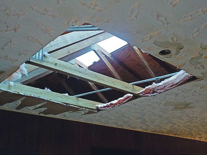 Tornado damage to a ceiling in Grand Bahama.

Photo: Denise Maycock