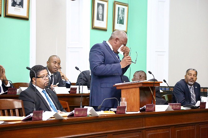 Prime Minister Dr Hubert Minnis wipes away tears in the House of Assembly. Photo: Terrel W Carey/Tribune staff