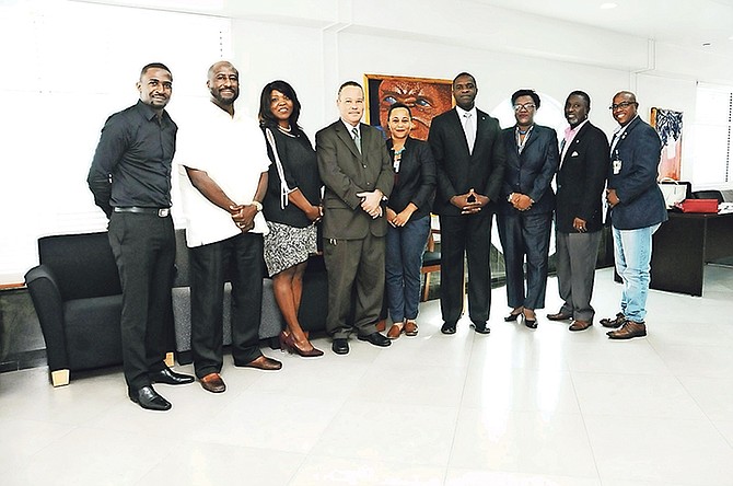 Attorney General Carl Bethel, centre, and Minister of State for Legal Affairs Elsworth Johnson met with representatives of civil society organisations, the National LEAD Institute, ORG and Our Carmichael, to discuss the Interception of Communication Bill and National Intelligence Agency Bill on Friday. Pictured from left, Senator Ranard Henfield, Director of Public Prosecution Garvin Gaskin, Peggy Williams of Our Carmichael, Mr Bethel, Chauntez Wilson of ORG, Mr Johnson, Kenrah Newry, Marco Rolle, and Troy Clarke of the National LEAD Institute. 

