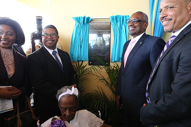  Prime Minister Dr. Hubert Minnis, was in West End, Grand Bahama on Friday for the Commissioning of the West End Community Clinic. Shown from left are: Pakesia Parker-Edgecombe, Parliamentary Secretary for Information and Communications in the Office of the Prime Minister and MP for West Grand Bahama and Bimini; K. Peter Turnquest, Deputy Prime Minister and Minister of Finance; Prime Minister Dr Hubert Minnis; and Minister of Health, Dr. Duane Sands. Seated is the oldest resident of West Grand Bahama, 99-year-old Aleisha Thompson.  (BIS Photo/Lisa Davis)
