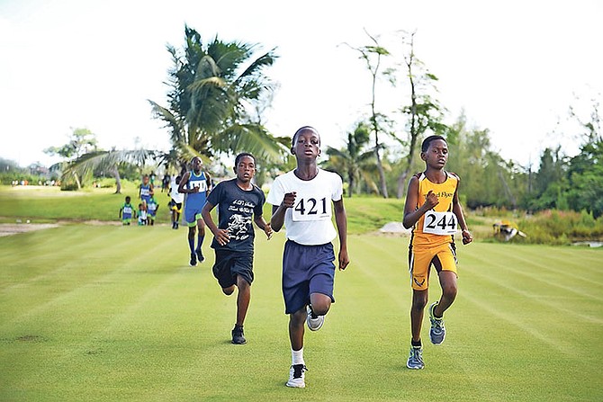 KEEPING THE PACE: More than 500 athletes from various high schools compete Saturday in the first William ‘Knucklehead’ Johnson Cross Country Championships at the Bahamas Golf Federation’s Driving Range.

Photos: Shawn Hanna/Tribune Staff