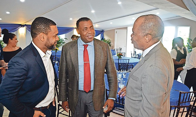 Marcus Laing and Carlos Hepburn with former Managing Director of the Public Hospitals Authority Herbert Brown. Photo: Zhivago McPhee – Head of Audio/Visual Department PHA

