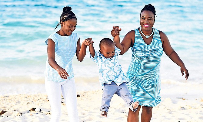 Sierra and her mother Tosheena with two-year-old Roman, the inspiration for their new book.
