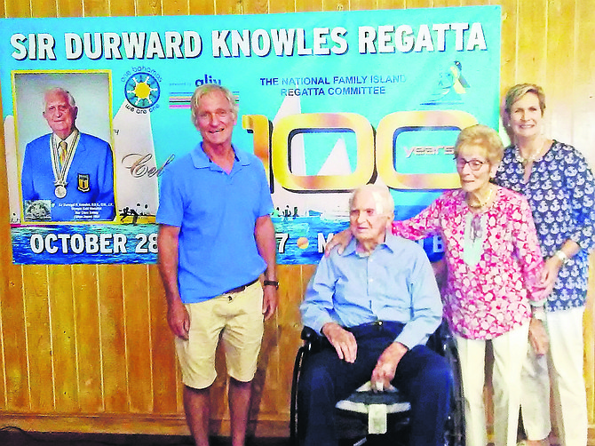 Sir Durward Knowles is flanked by his wife Holly and two of his children Randy and Charlotte Knowles.
