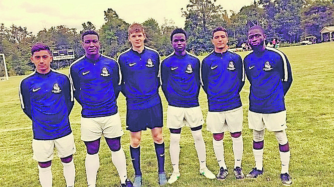 Cameron Kemp (third from right) with other players on his school's soccer team.
