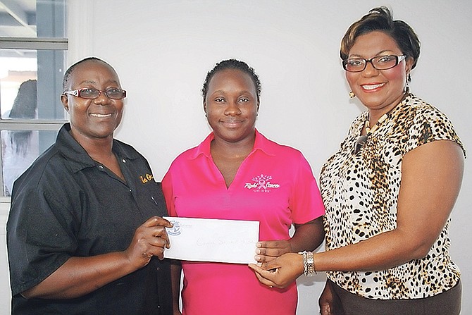 (l-r) BTVI Cafeteria co-operator Mary Laurenceau, the Cancer Society of the Bahamas transportation attendant Jacqueline Cash, and BTVI’s assistant vice president of Fund Development, Alicia Thompson. (Photo/Shantique Longley)

