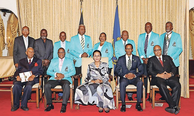 Governor-General of The Bahamas Dame Marguerite Pindling (seated, centre) is photographed with honourees and stakeholders at the induction ceremony for the National Sports Hall of Fame Induction Class of 2017, on November 17, 2017, at Government House. Also pictured seated (from left) are Sir Orville Turnquest (receiving for his late wife Lady Edith Turnquest); Minister of Youth, Sports and Culture the Hon. Michael Pintard; Director of Sports Timothy Munnings; and Bahamas Olympic Committee President Rommel "Fish" Knowles.  Standing (from left) are Pastor Emeritus of East Street Gospel Chapel Pastor Tom Roberts; Chief Sports Recreation Officer Kevin Colebrooke; and honourees Leo Rolle, Michael "Mike" Sands, Patricia Elaine Thompson, Godfrey Eneas, Fletcher J. Lewis, Jr., and Rudy Levarity.  
