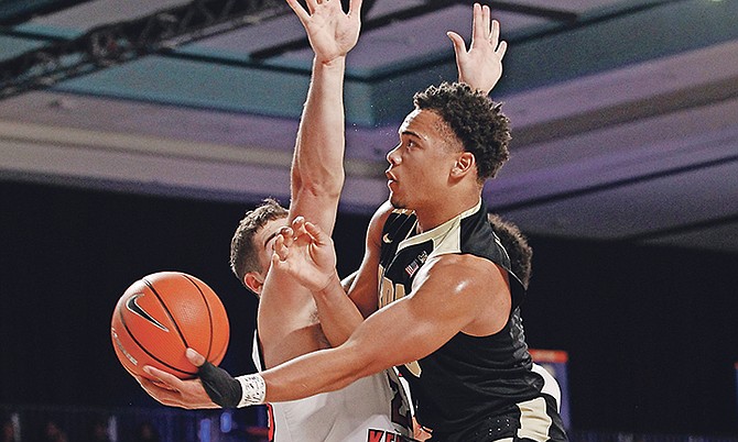 Purdue guard Carsen Edwards (3) drives to the basket against Western Kentucky during last night’s NCAA college game in the Battle 4 Atlantis tournament on Paradise Island, Bahamas.

Photo: Tim Aylen/Bahamas Visual Services

 