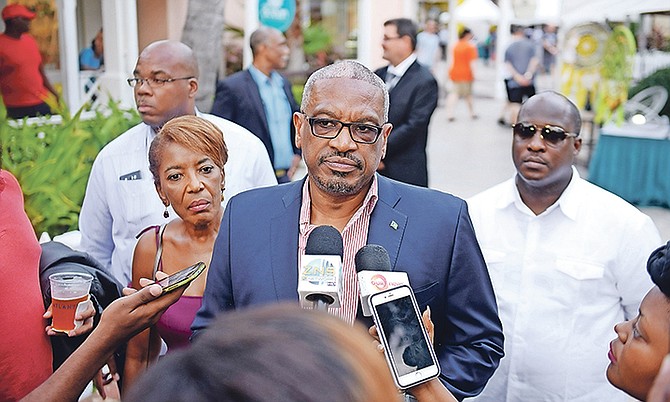 Prime Minister Dr Hubert Minnis and his wife, Patricia, at Marina Village on Paradise Island on Saturday. Photo: Shawn Hanna/Tribune Staff

