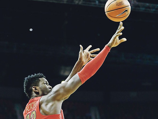 Arizona’s Deandre Ayton shoots during the first half of Saturday’s NCAA college basketball game against UNLV in Las Vegas.

(AP Photo/Isaac Brekken)

