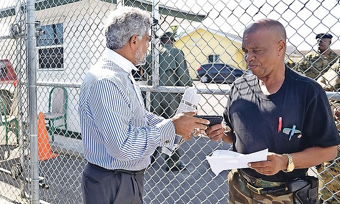 Jean Rony Jean-Charles' family’s lawyer Fred Smith, QC, outside the Detention Centre on Tuesday. Mr Smith is asking the Department of Immigration for proof of the repatriation. Photo: Shawn Hanna/Tribune Staff