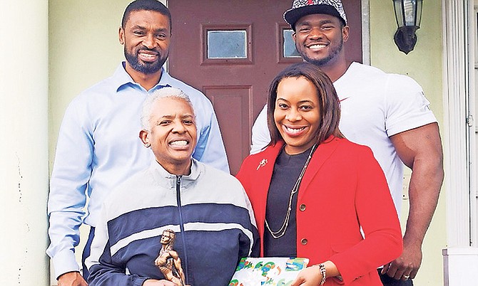 The Bahamas Bodybuilding and Fitness Federation made a presentation to former bodybuilder Faye Rolle at her home over the Christmas holiday.