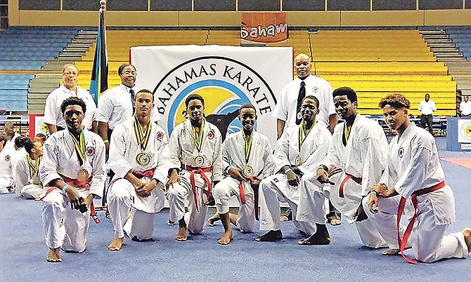 The national senior and junior team members with their coaches. Photo: Bahamas Karate Federation 