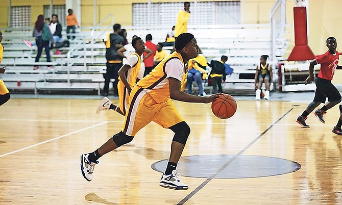 FAST BREAK: The tournament for primary boys and girls and junior girls got started at the Anatol Rodgers Gymnasium on Saturday.

Photo: Terrel W Carey/Tribune Staff

 