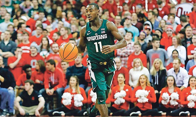 Michigan State guard Lourawls Nairn Jr drives against Ohio State during Sunday’s NCAA game in Columbus, Ohio. Ohio State won 80-64. (AP)
