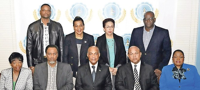 The new executive management team of the Ministry of Education. Pictured in the front row; from left are: Sharon Poitier, Marcellus Taylor, Minister of Education Jeff Lloyd, Donovan Turnquest and Serethea Clarke. (Back row, from left) Julian Anderson, Eulease Beneby, Isla Deane and Reginald Saunders.

 